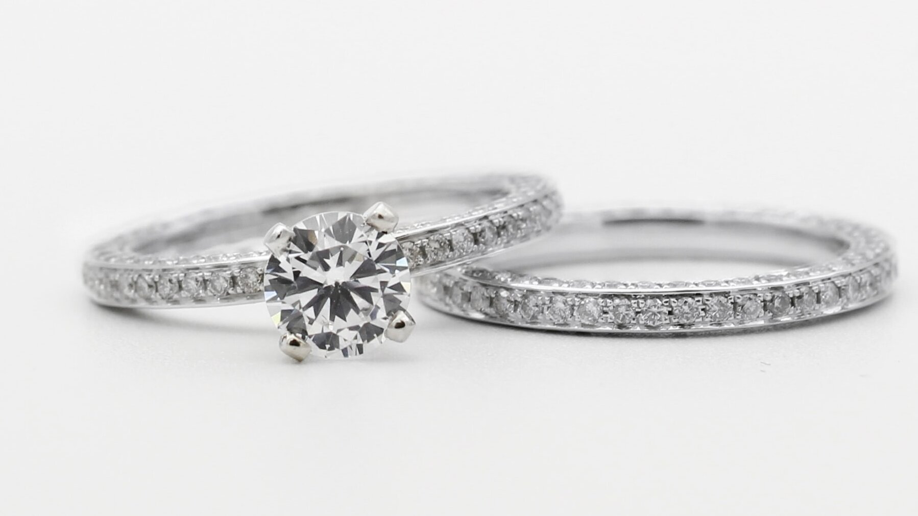 pave diamond ring solitaire and pave wedding ring 