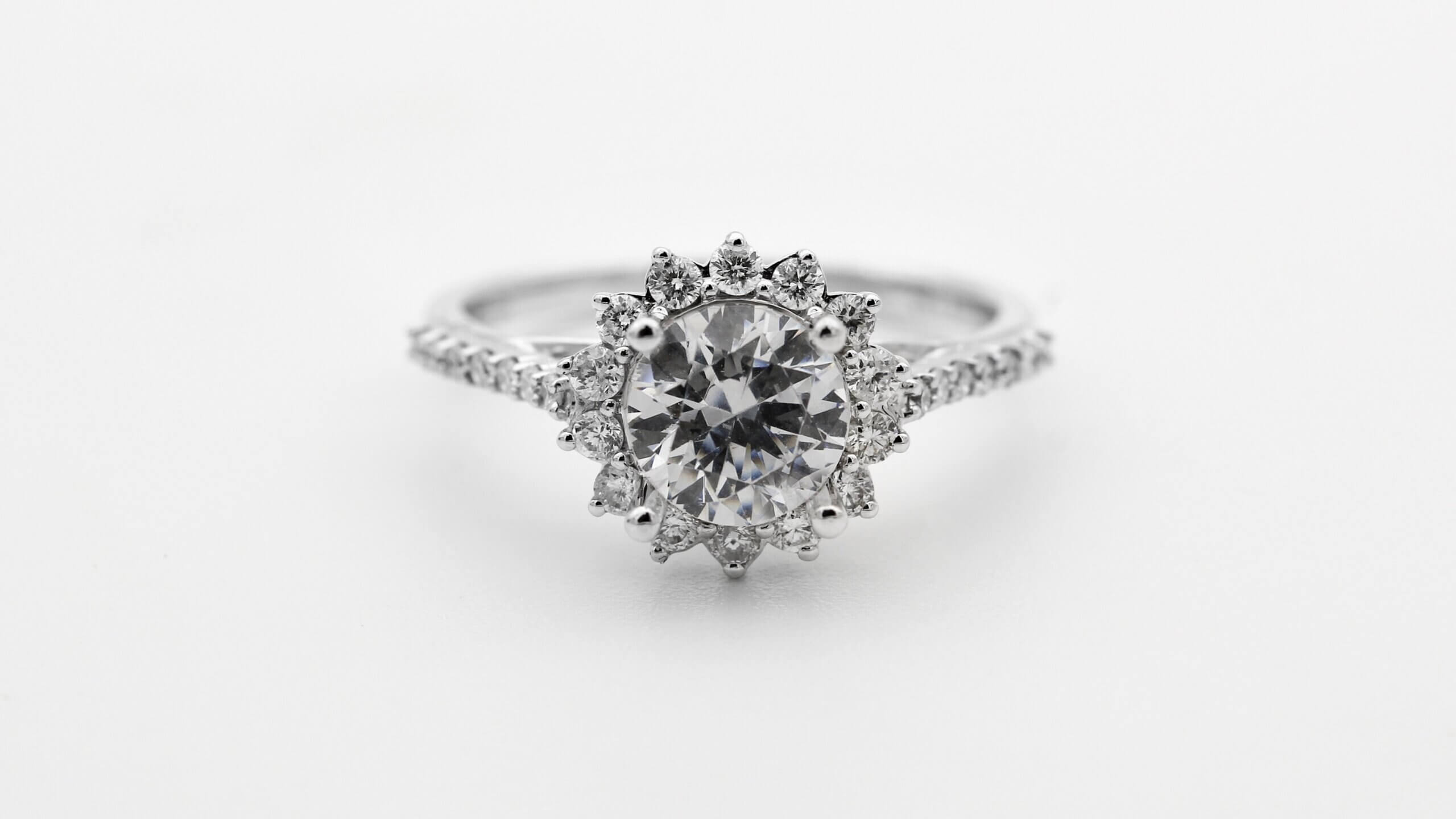 round cut diamond ring with flower shape