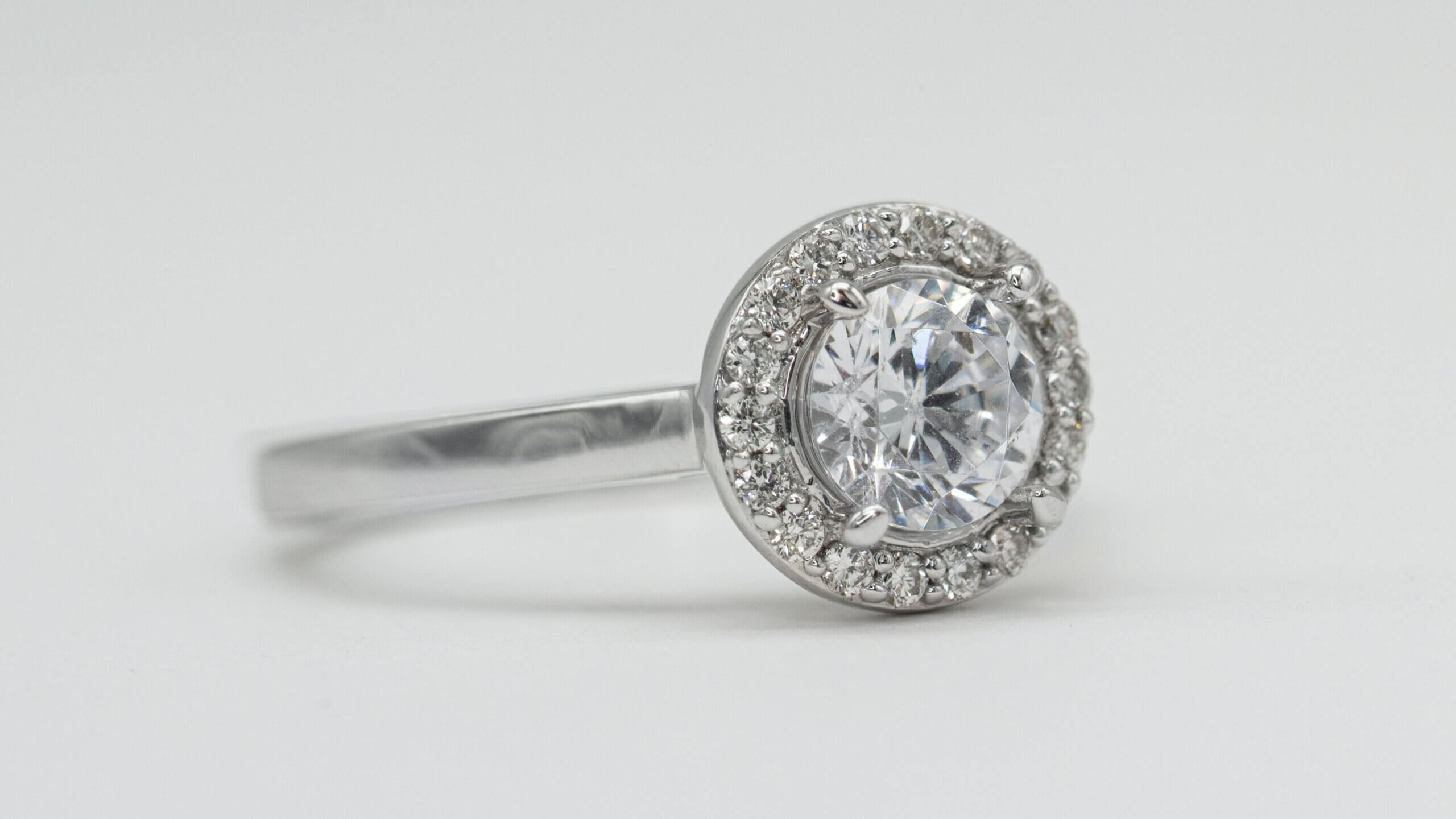 round halo diamond engagement ring hidden inclusion